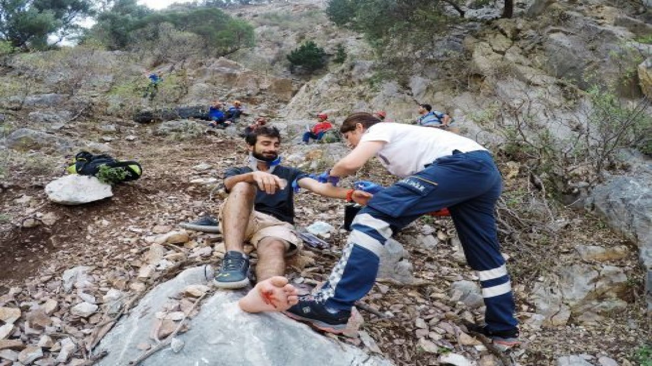 Kayalıklardan düşen genç 12 saatte kurtarıldı
