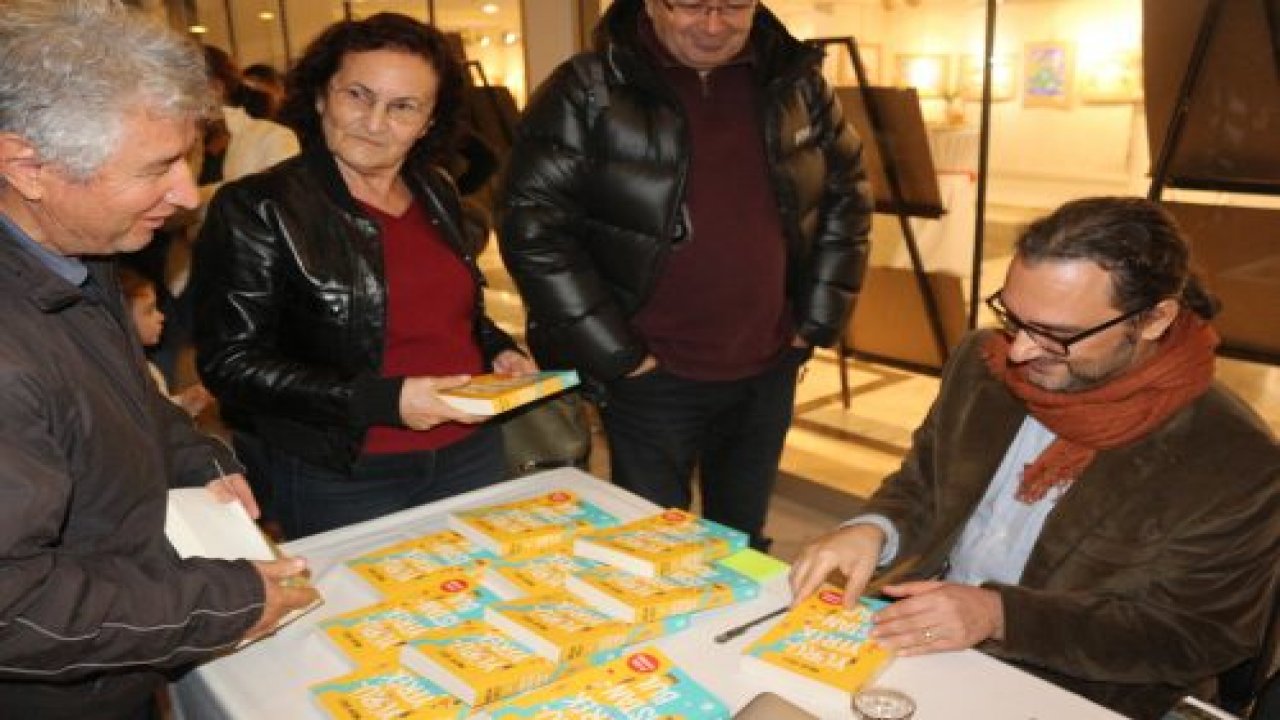 Uslu, Marmarisli kitapseverlerle buluştu