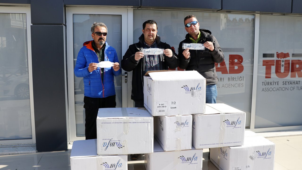 Muğlalı turizmcilerden koronavirüs salgını için Çin'e maske desteği