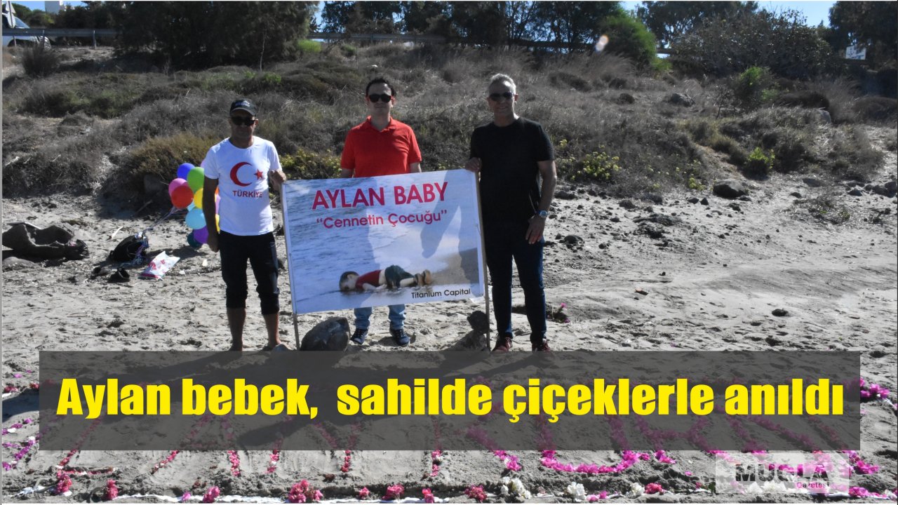 Aylan bebek,  sahilde çiçeklerle anıldı
