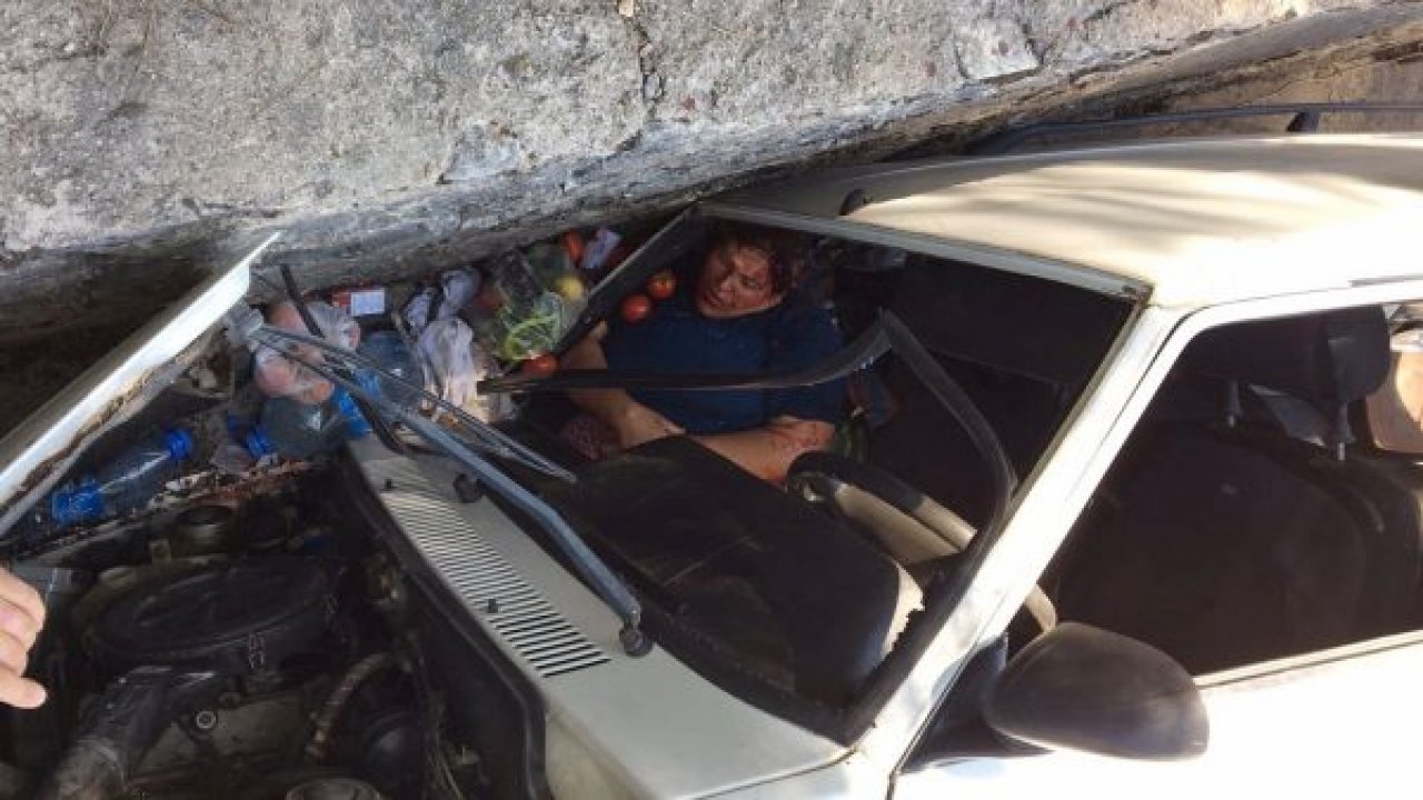 Yaralı kadın kurtarılmayı bekledi