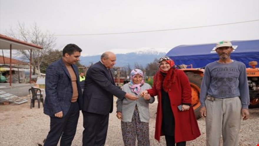 ORMAN YANGININDA EVLERİ YANAN AİLE YENİ EVLERİNE KAVUŞTU