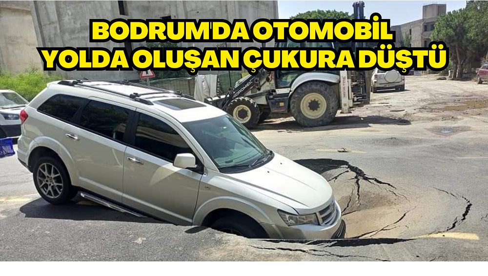 Bodrum'da otomobil yolda oluşan çukura düştü