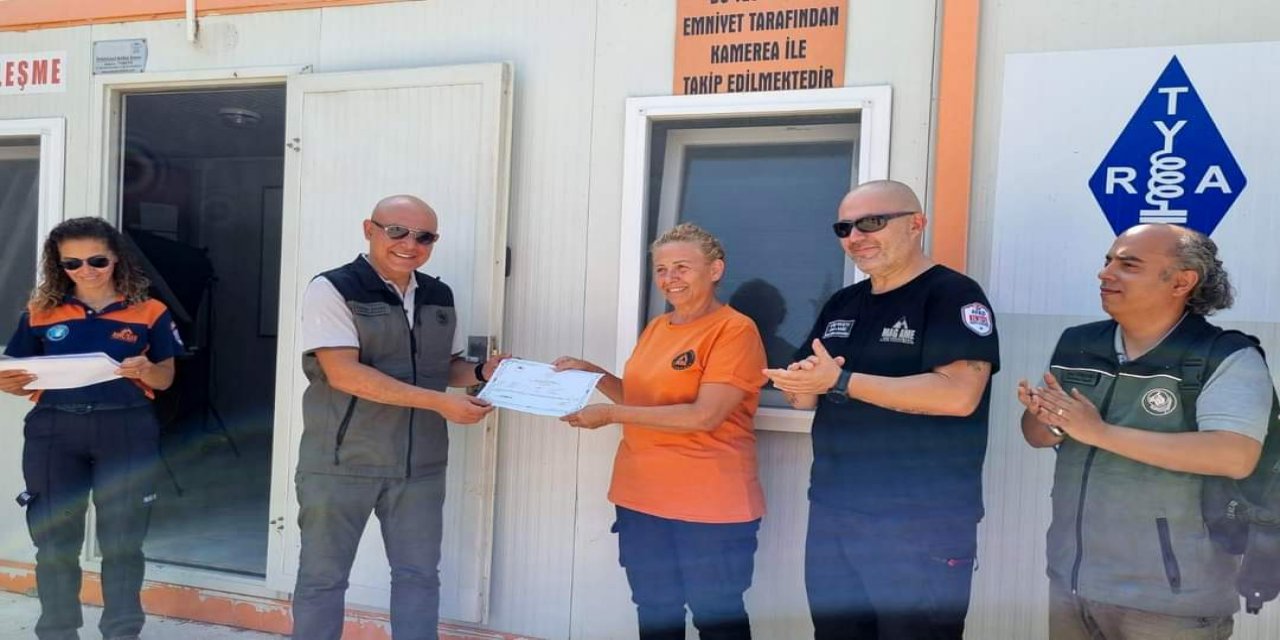 Datça'da yangın gönüllülerine sertifika ve koruyucu kıyafetleri dağıtıldı