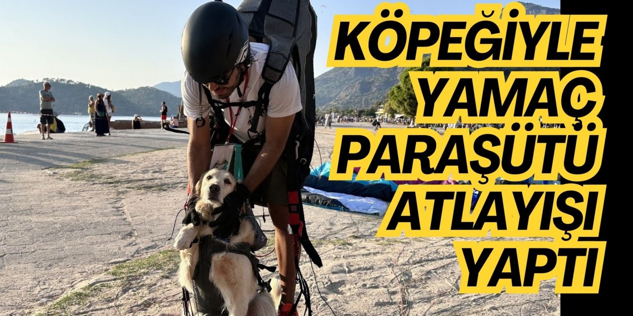 Köpeğiyle yamaç paraşütü atlayışı yaptı