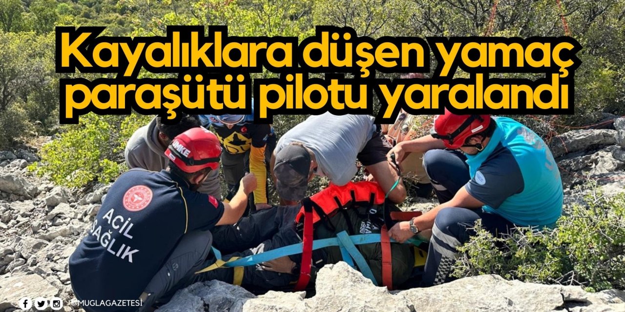Fethiye'de kayalıklara düşen yamaç paraşütü pilotu yaralandı