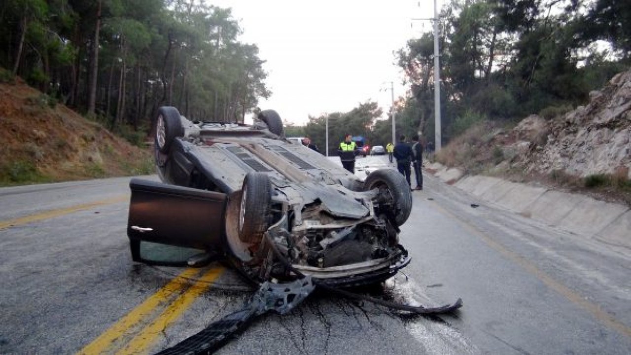 Takla atan otomobilden yaralı kurtuldu