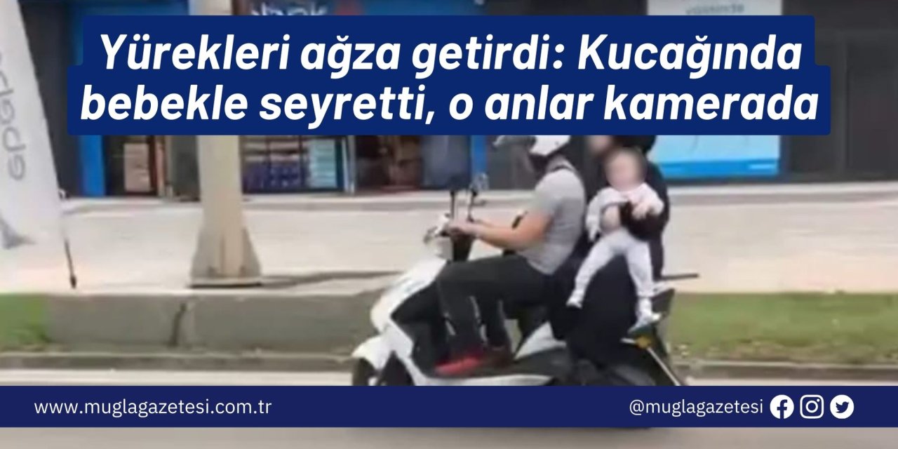 Yürekleri ağza getirdi: Kucağında bebekle seyretti, o anlar kamerada