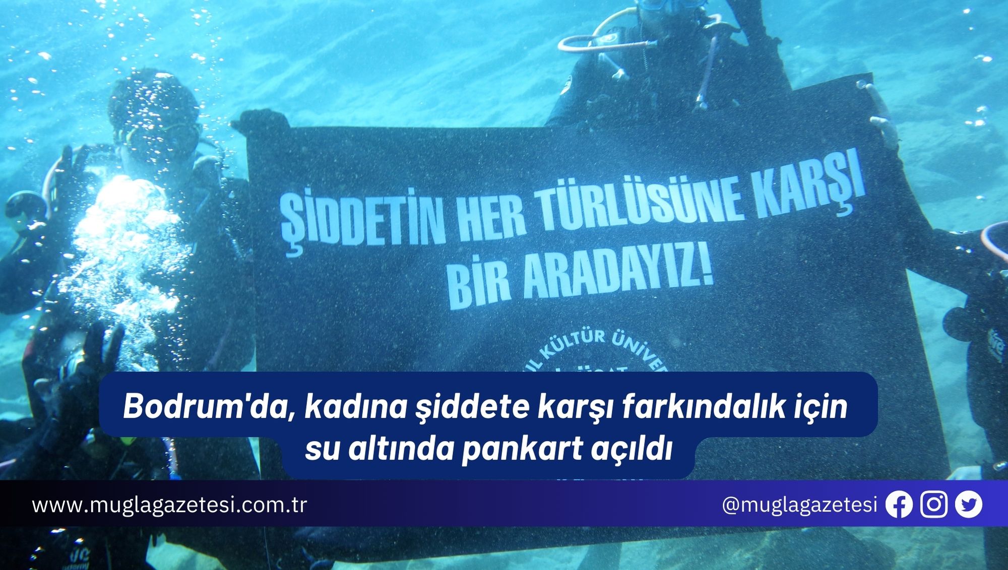 Bodrum'da, kadına şiddete karşı farkındalık için su altında pankart açıldı