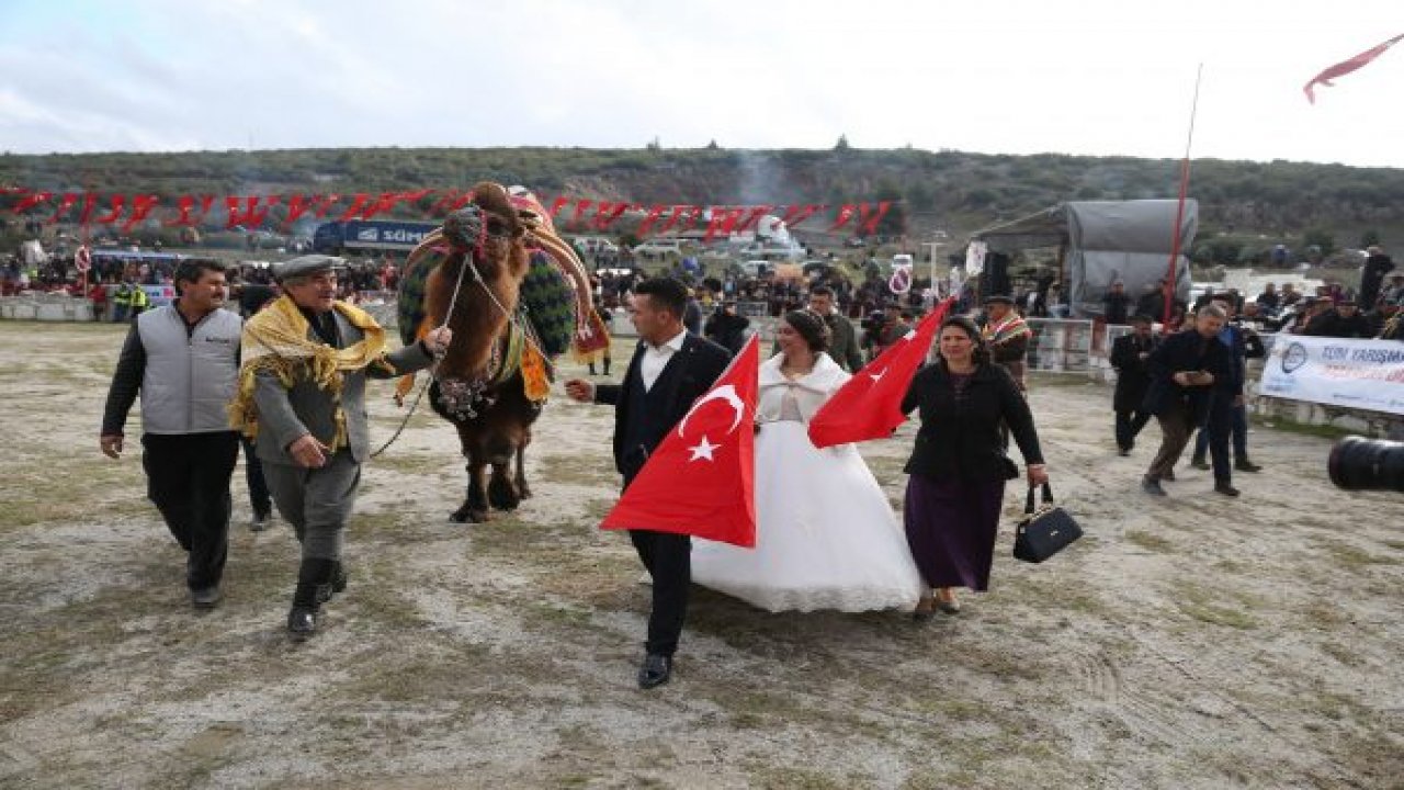 Gelinliği ile güreşleri izledi