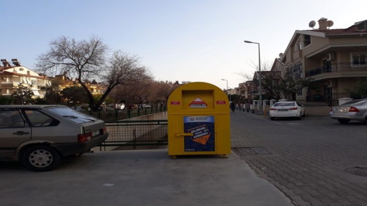 Giysiler çöpe değil kumbaraya