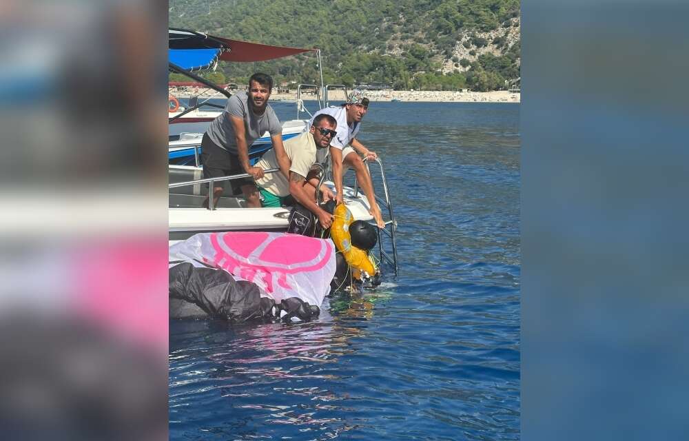 Babadağ’dan Atlayan Paraşütçü Denize Düştü: Yaşam Savaşı Veriyor
