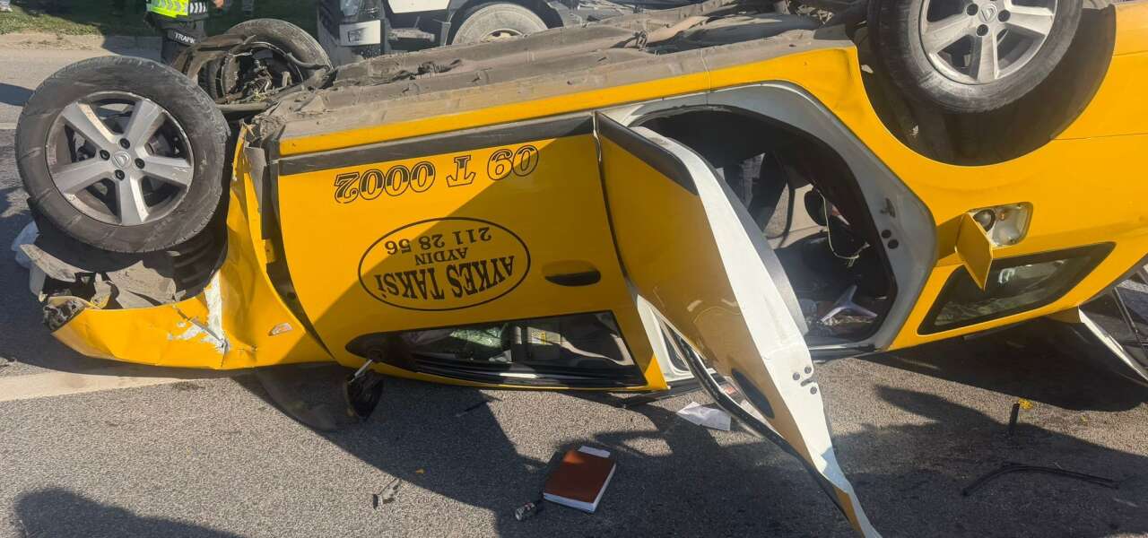 Muğla Karayolunda Taksi Bariyerlere Çarpıp Takla Attı: 2 Yaralı