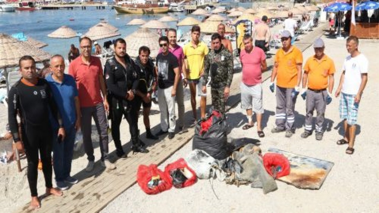 Halk plajında deniz dibi temizliği
